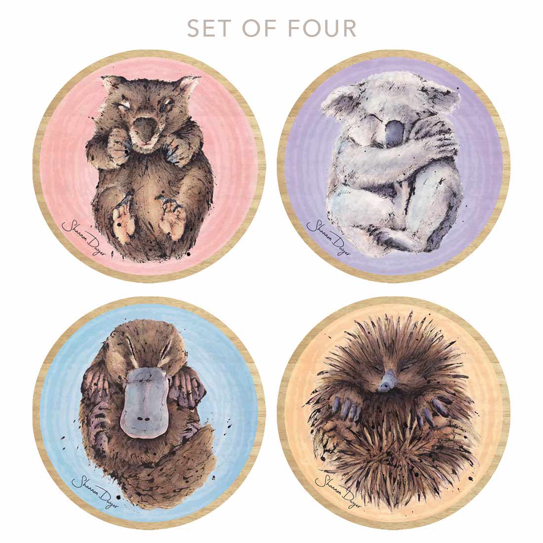 A set of four wooden coasters with different Australian animal illustrations, including a koala, a platypus , a echidna and a wombat
