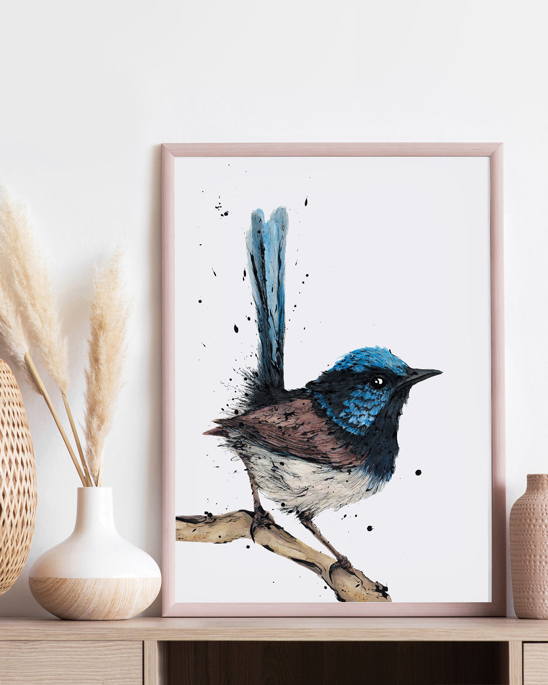 A framed Australian Superb Fairy-wren wall art by Shannon Dwyer displayed in a home interior
